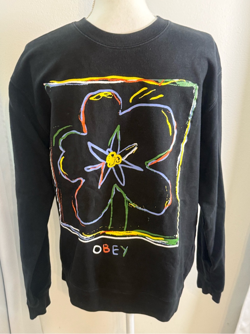 Obey Men’s Black Crewneck with Multicolor Floral Outline